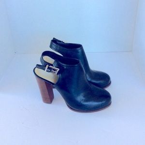 Vince Camuto black slingback heels.